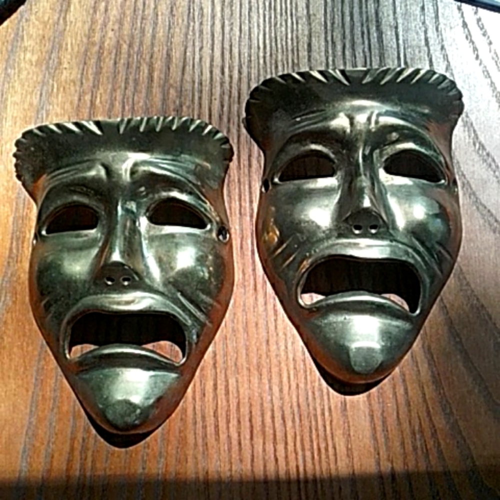 Set of brass faces.